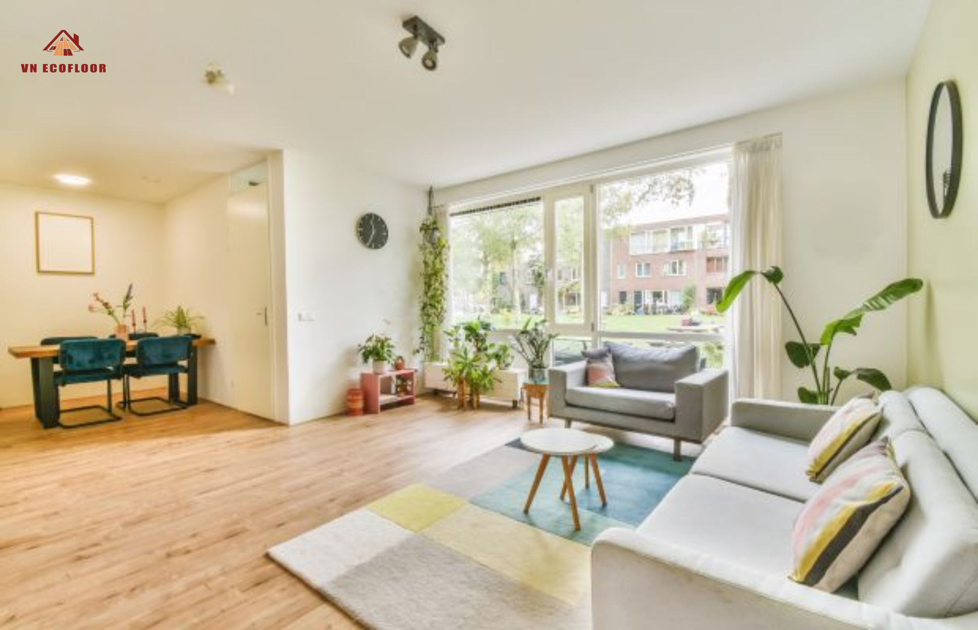 A durable laminate floor provides a beautiful foundation for the living room